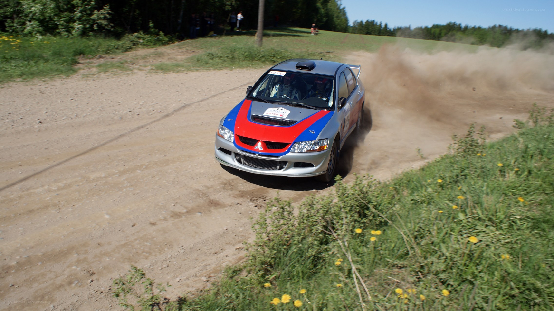 Rally car on dirt track