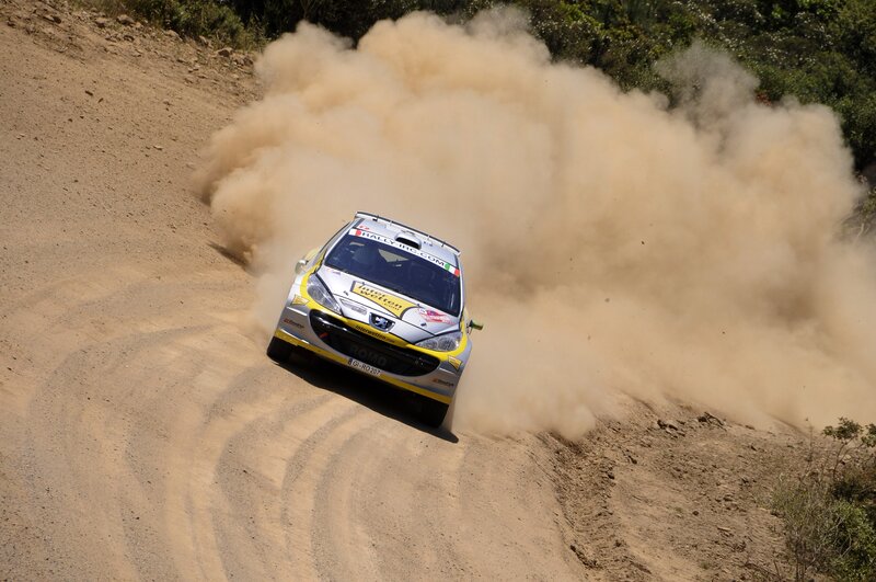 Rally car on dirt track