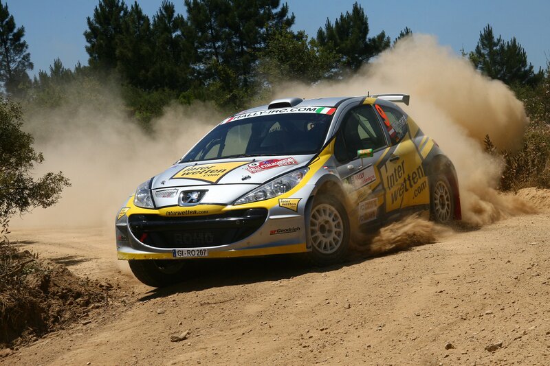 Rally car on dirt track