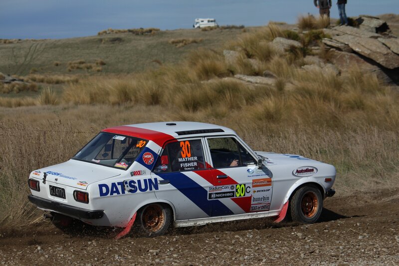 Rally car on dirt track