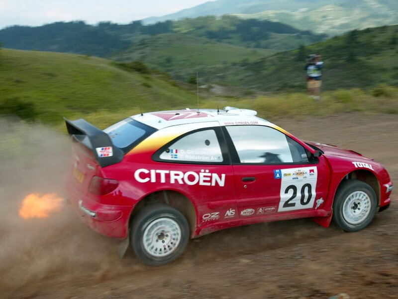 Rally car on dirt track