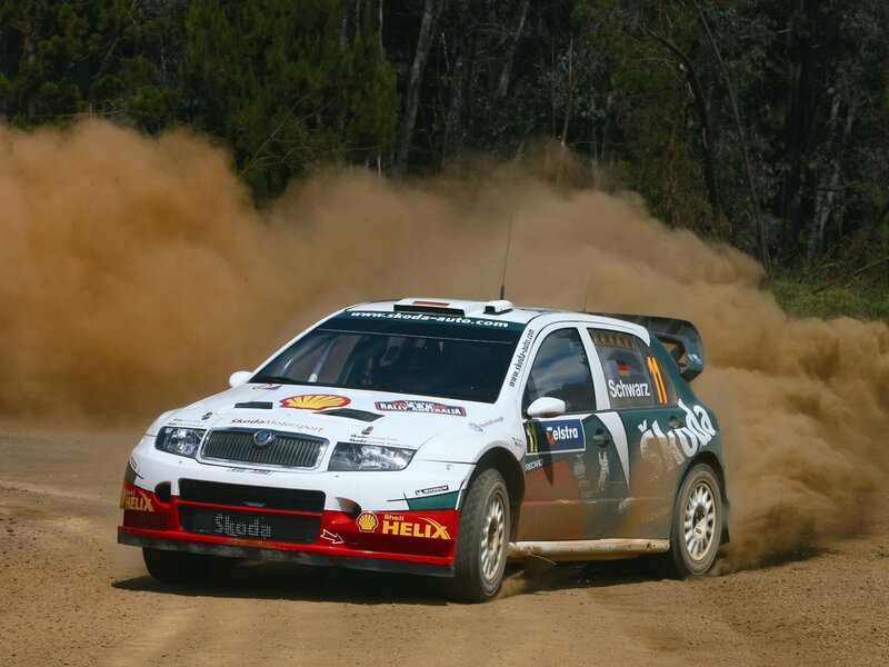 Rally Car on Dirt — White, Dynamic, Afternoon, Photograph, Dirt Road, Trees, Dust Cloud