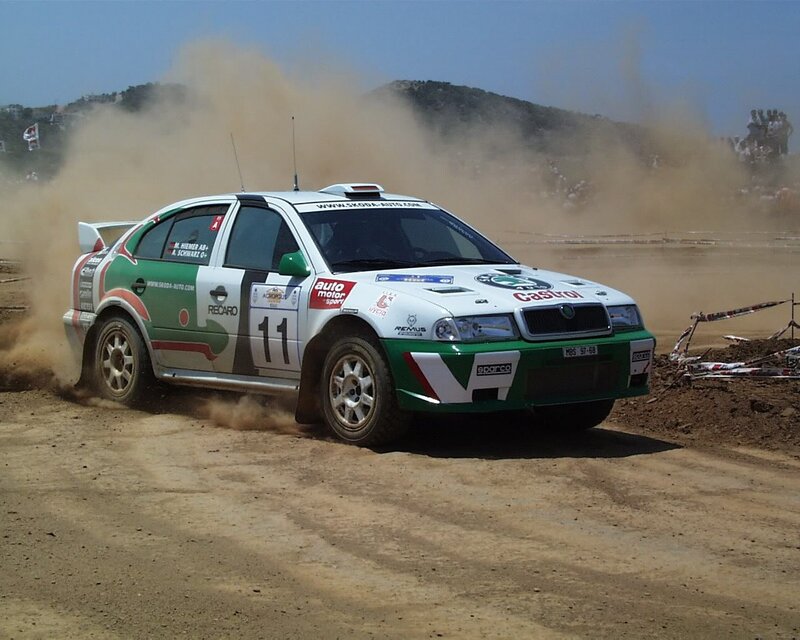Rally Car on Dirt — White, Dynamic, Afternoon