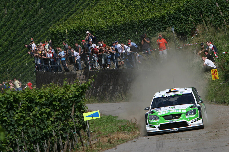 Rally car on dusty road