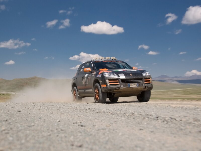 rally car on dusty road