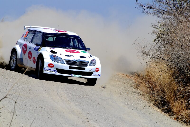 Rally car on dusty road