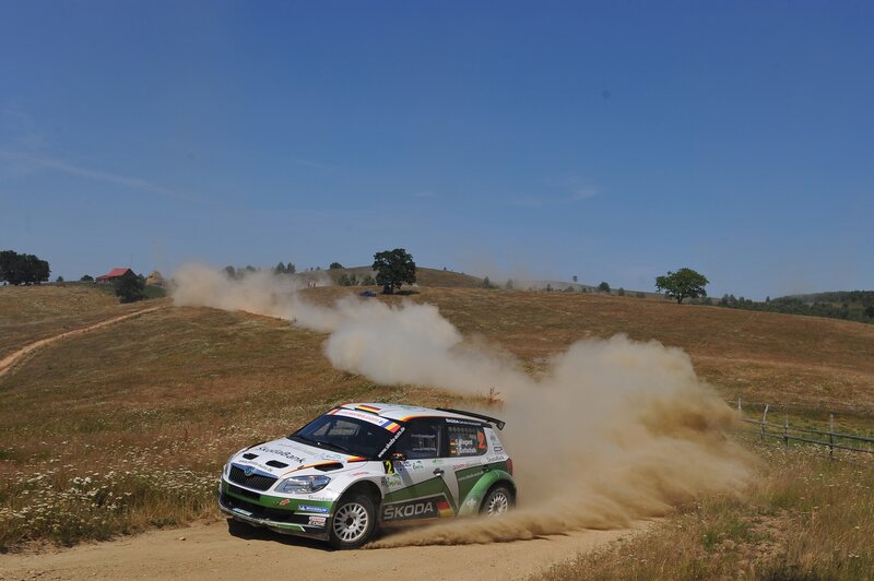 Rally car on dusty road