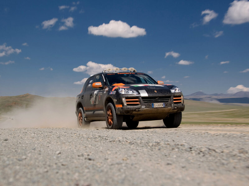 rally car on dusty road