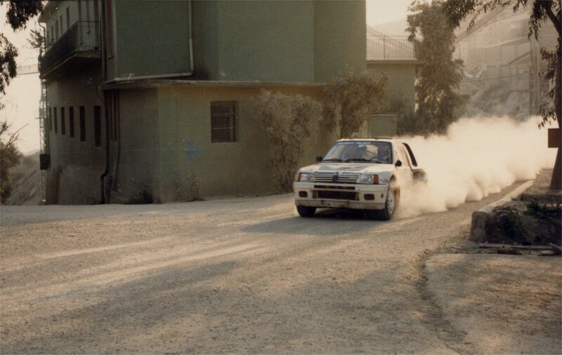rally car on dusty road