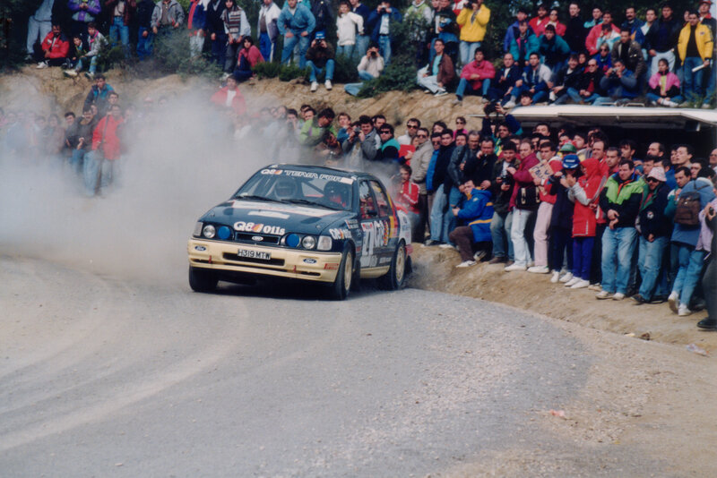Rally car on dusty road