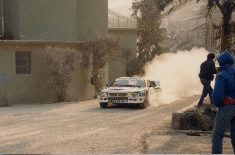 Rally car on dusty street