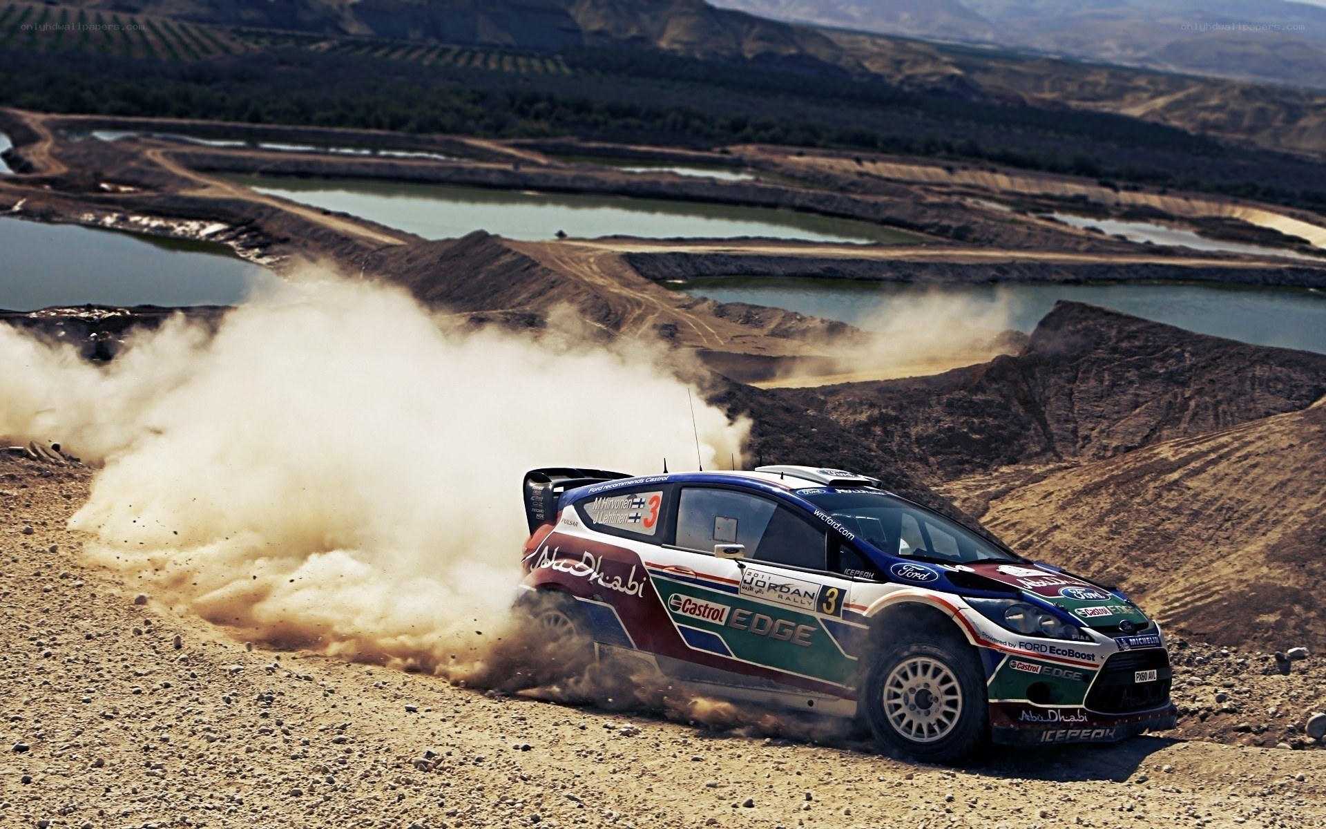 Rally car on dusty terrain