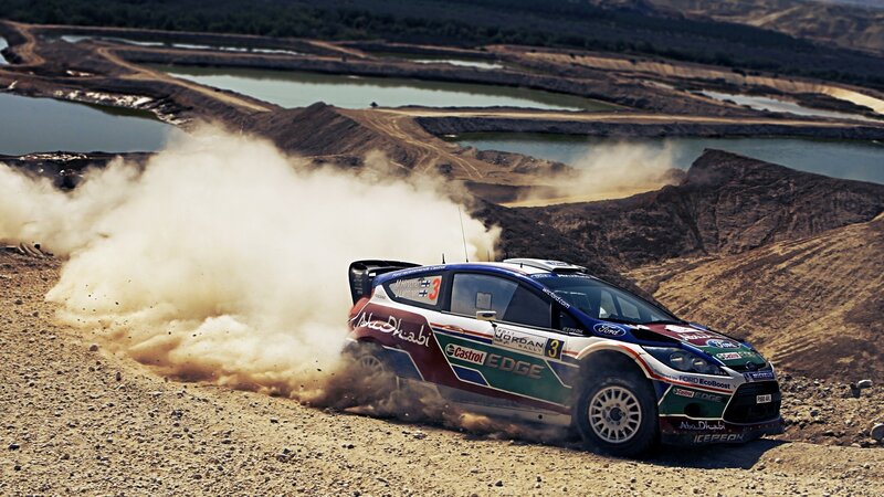 rally car on dusty track