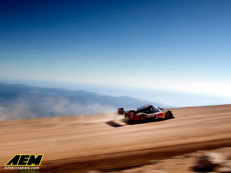 Rally car on dusty track