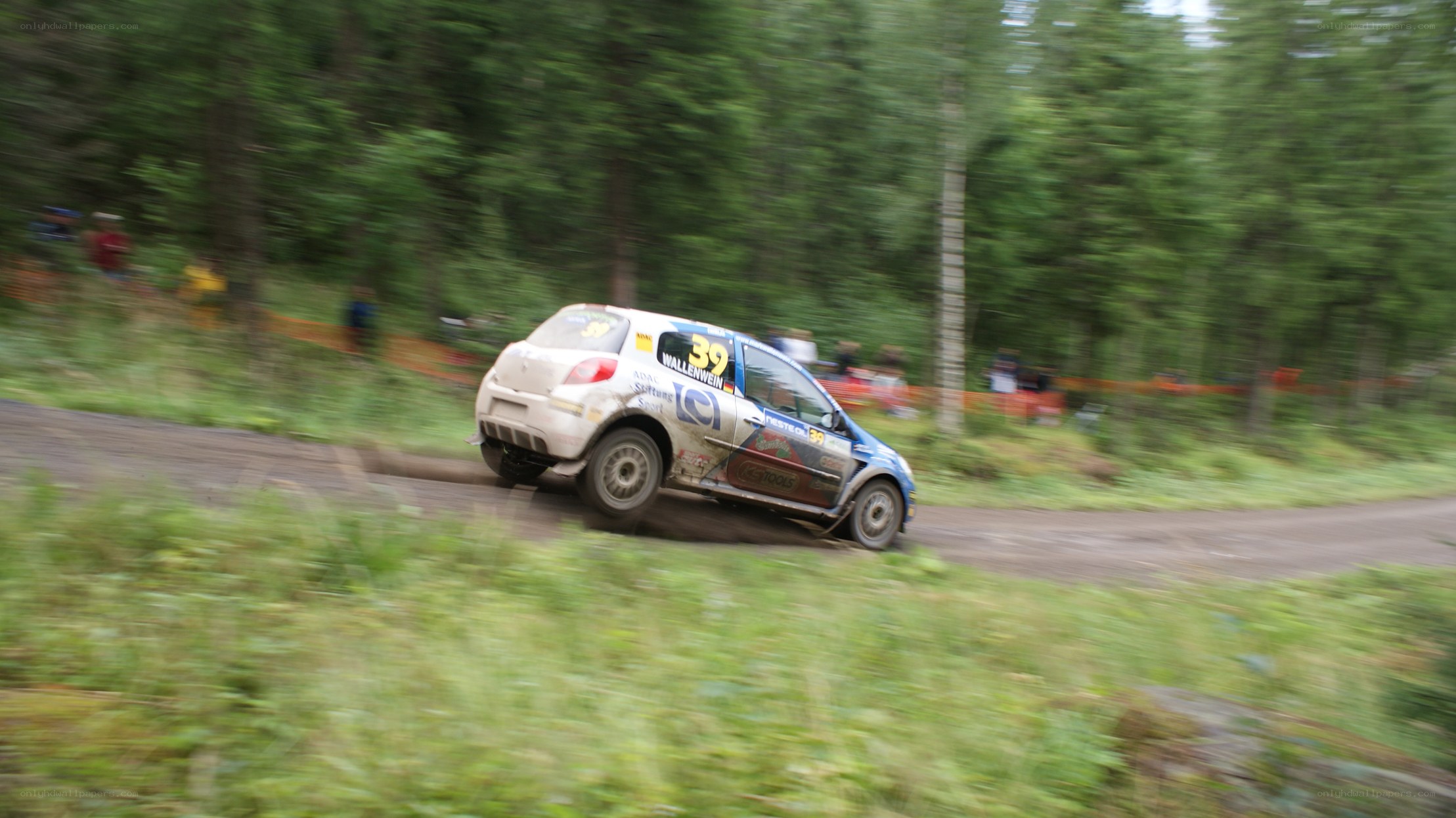 Rally car on forest track