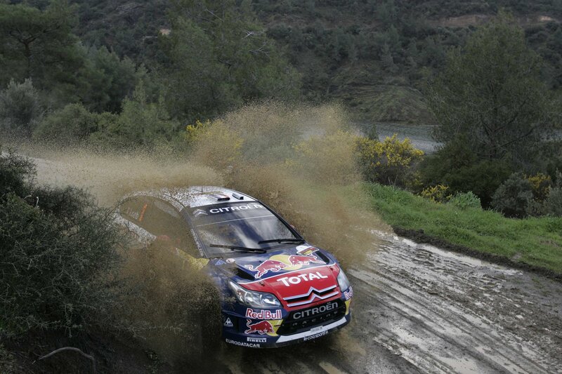 Rally car on muddy road