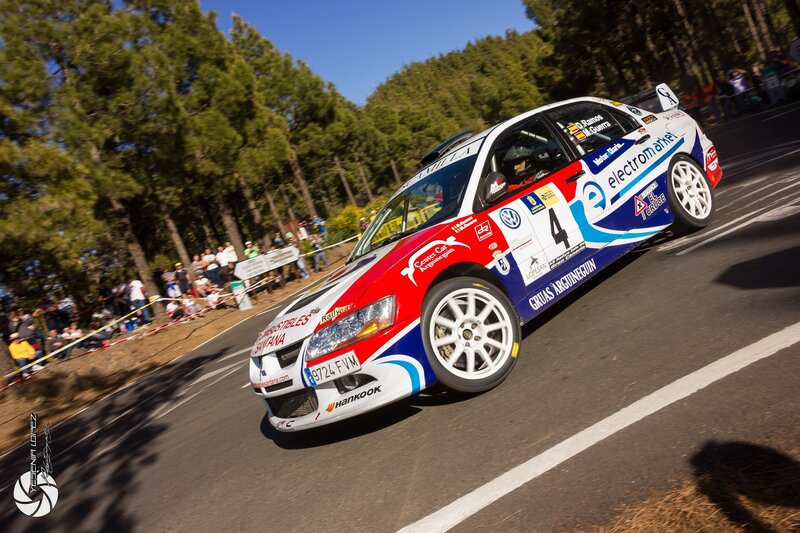 Rally Car on Road — Red, Dynamic, Afternoon