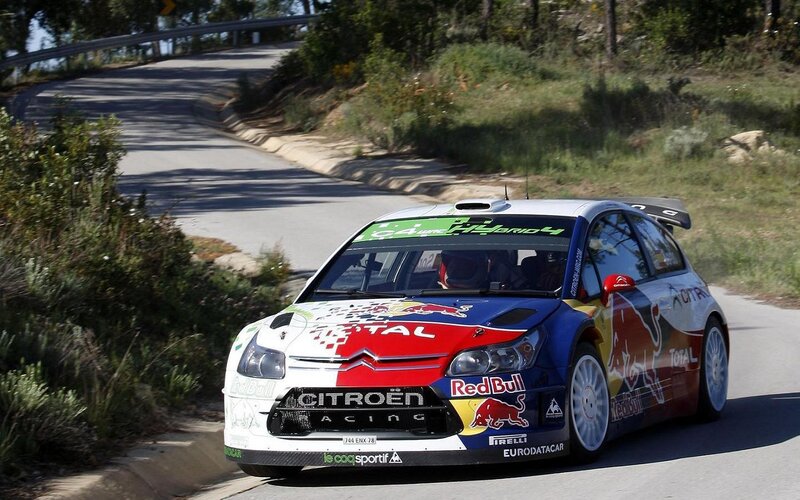 Rally Car on Road — White, Dynamic, Afternoon, Photograph, Trees, Bushes