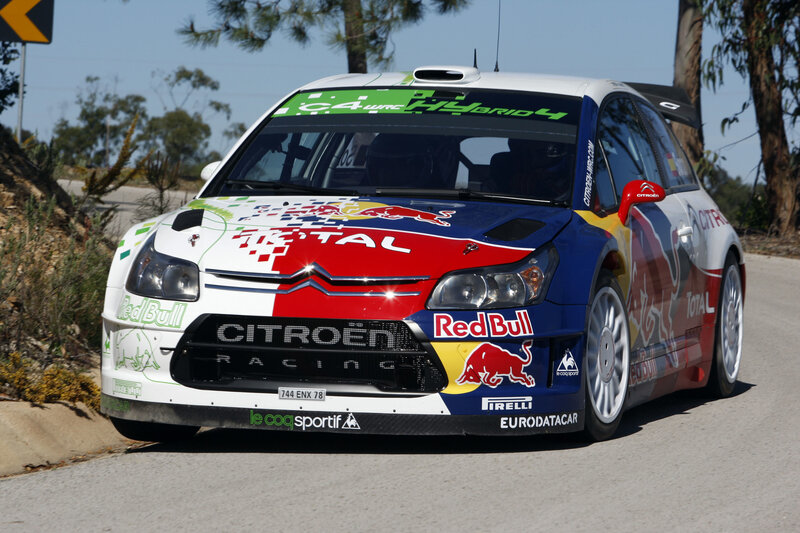 Rally Car on Road — White, Dynamic, Afternoon