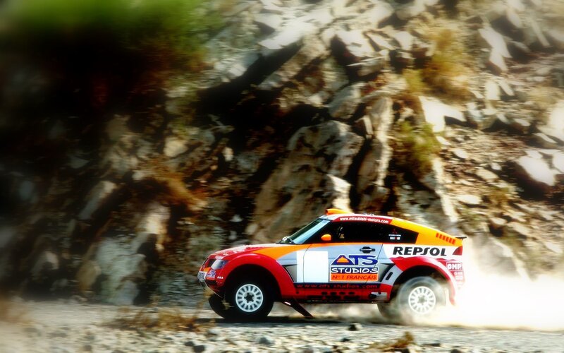 Rally car on rocky terrain