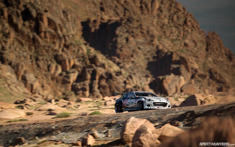 Rally Car on Rocky Terrain — Brown, Dramatic, Afternoon
