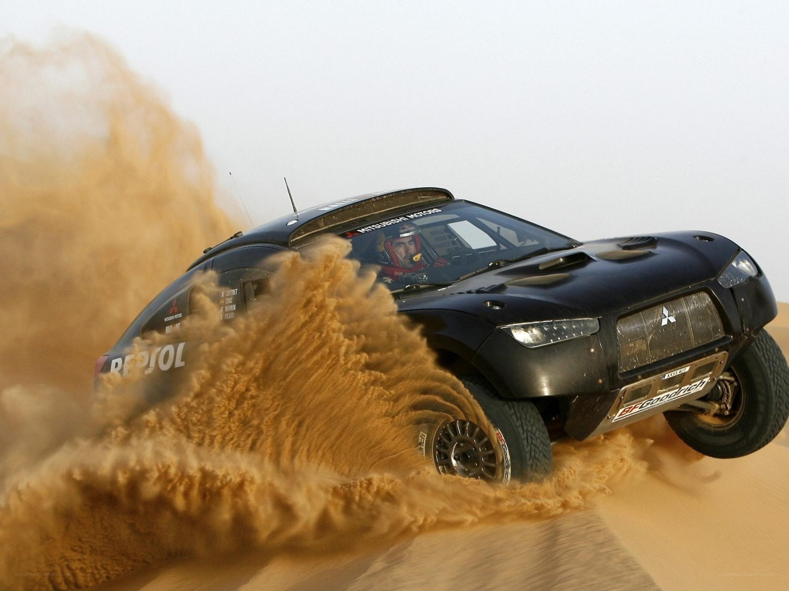 Rally car on sand dune