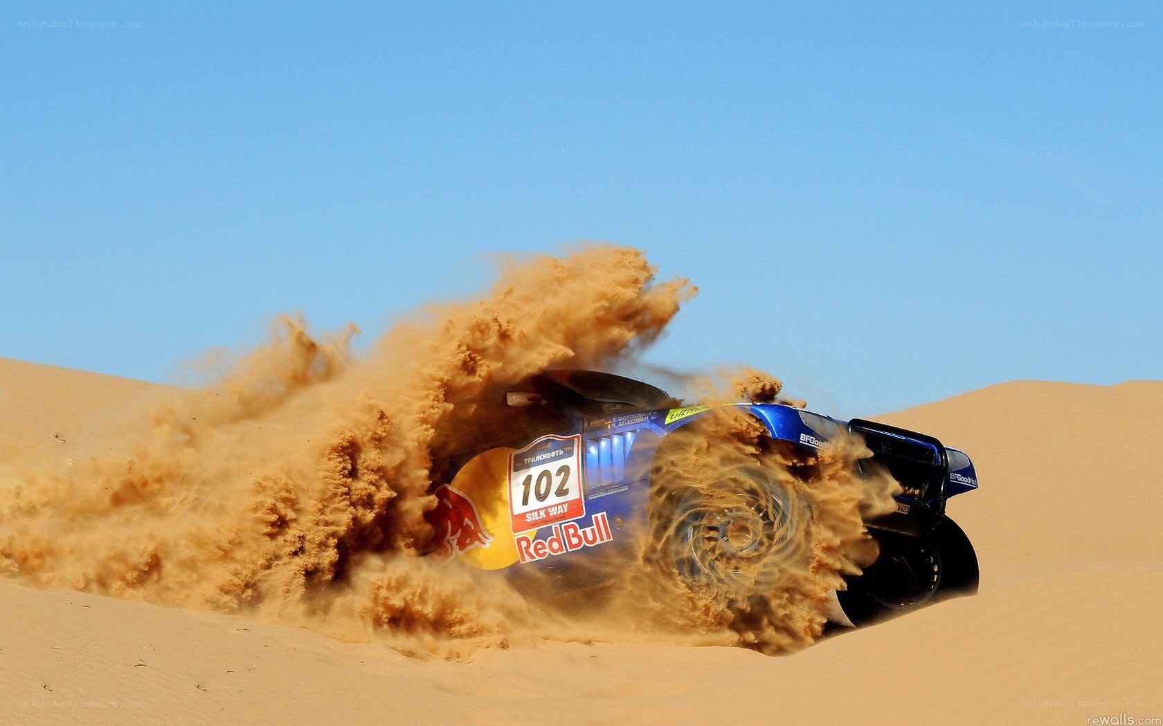 Rally car on sand dune