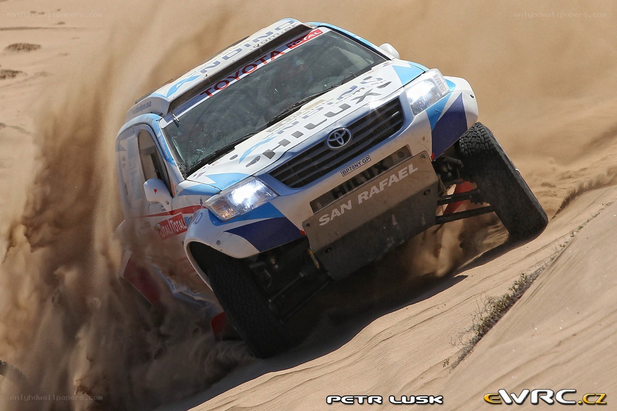 Rally car on sand dune