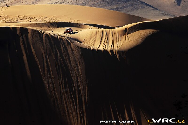 Rally car on sand dune