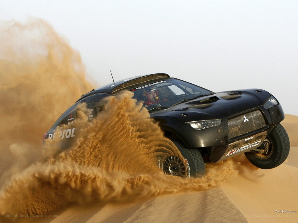Rally car on sand dune