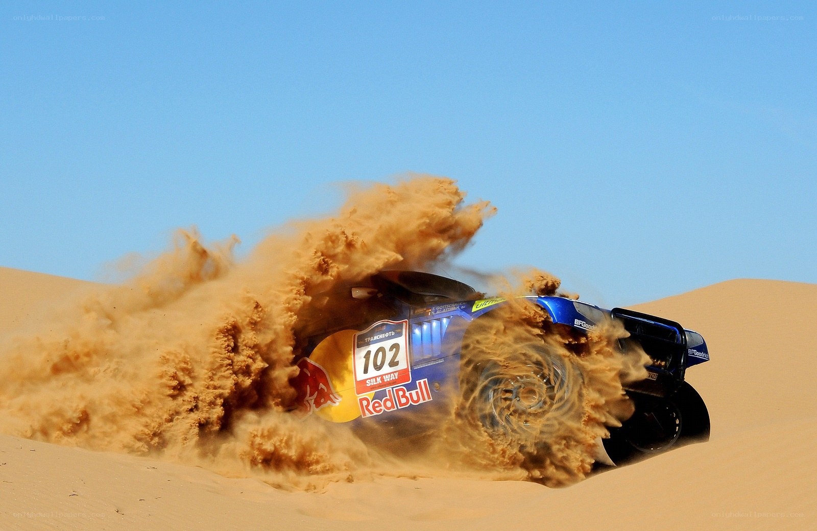 Rally car on sand dune