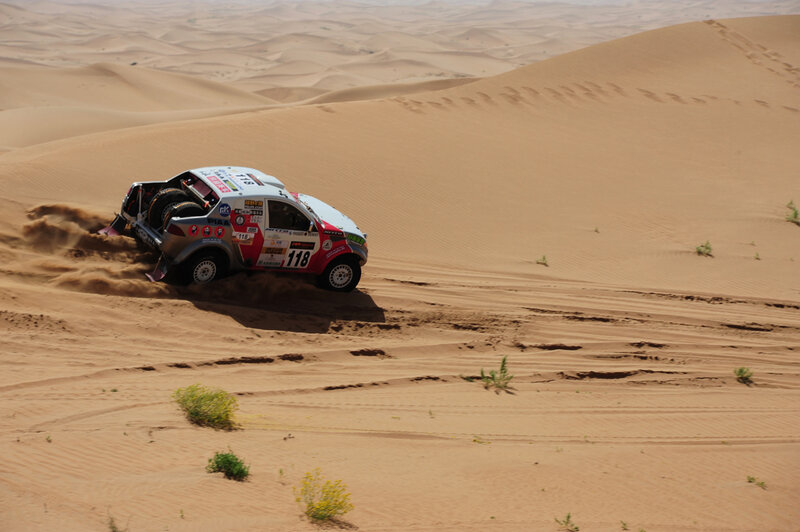 Rally Car on Sand Dune — Brown, Dynamic, Afternoon, Photograph, Sand Dunes, Dust