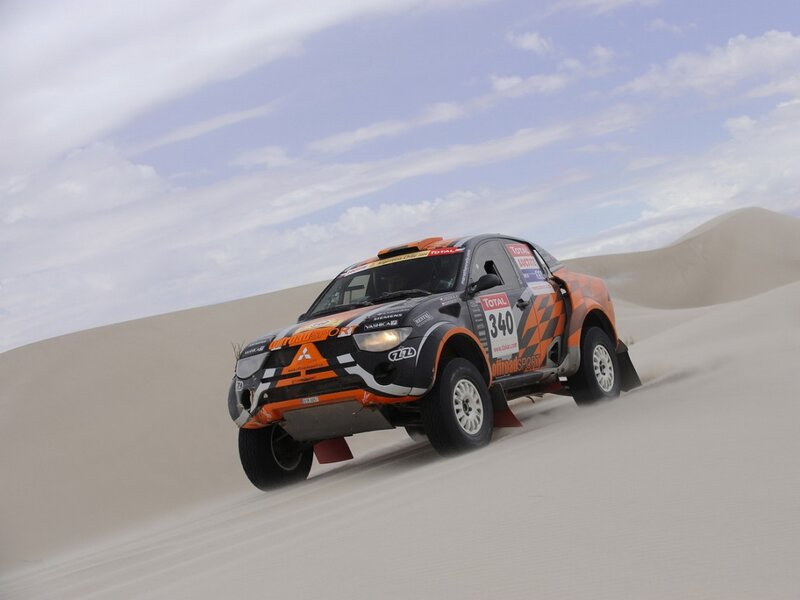 Rally Car on Sand Dune — Orange
