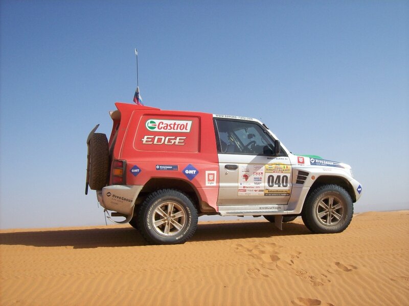 Rally Car on Sand Dune — Red