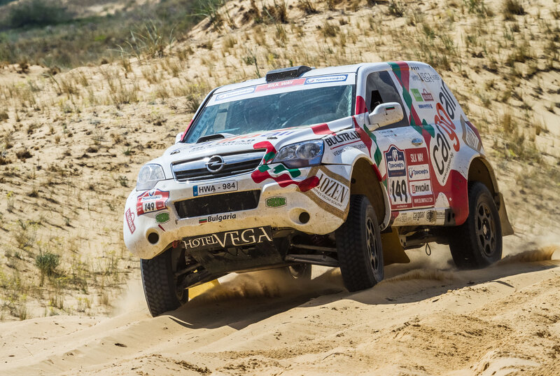 Rally Car on Sand Dune — White, Dynamic, Afternoon