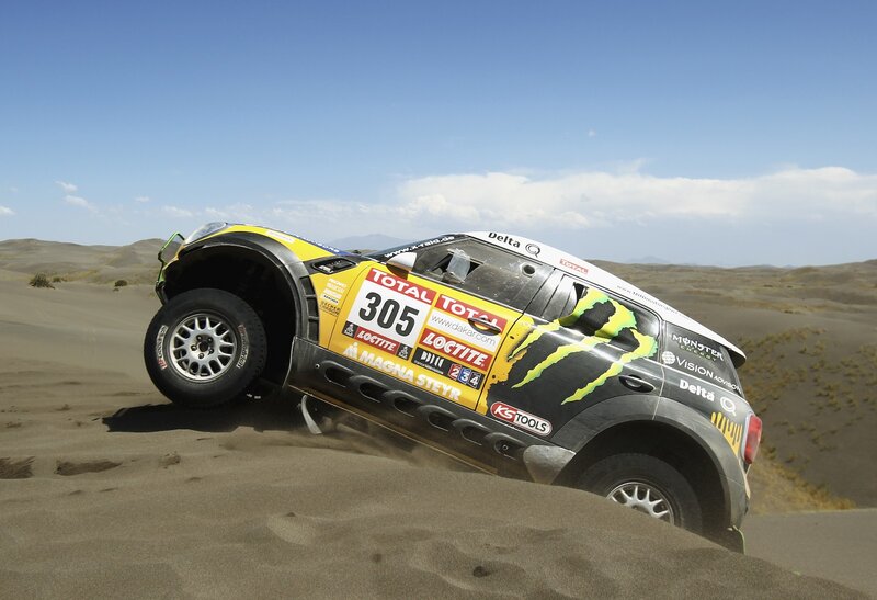 Rally car on sand dunes
