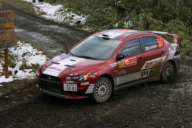 Rally car on snowy dirt road