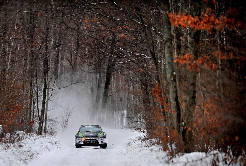 Rally car on snowy forest road