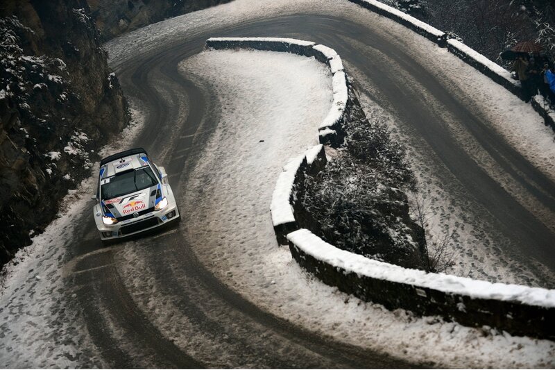 Rally car on snowy mountain road