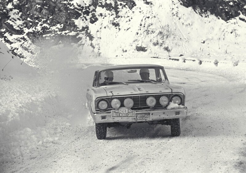 Rally car on snowy mountain road