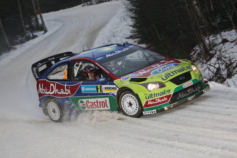rally car on snowy road