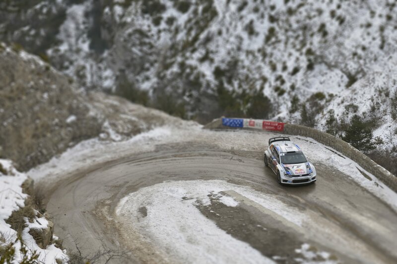 Rally Car on Snowy Road — White