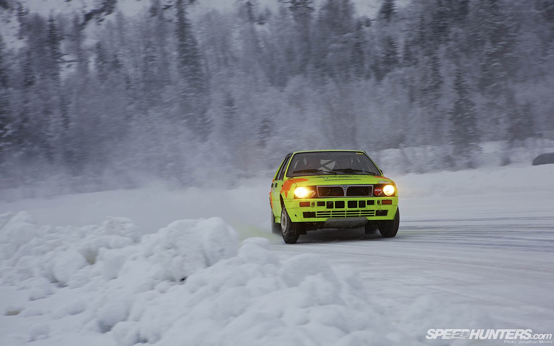 rally car on snowy track