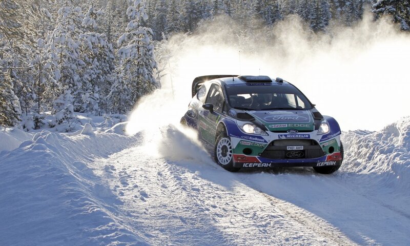 Rally car on snowy track
