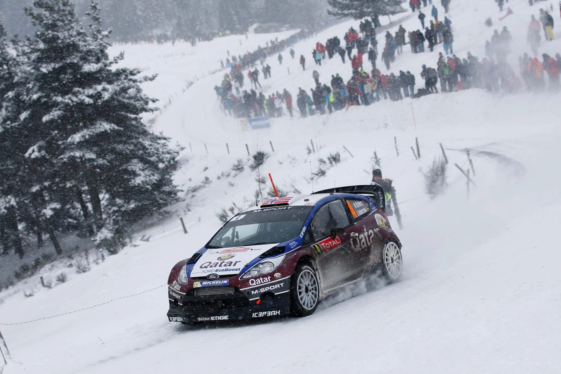 Rally car on snowy track
