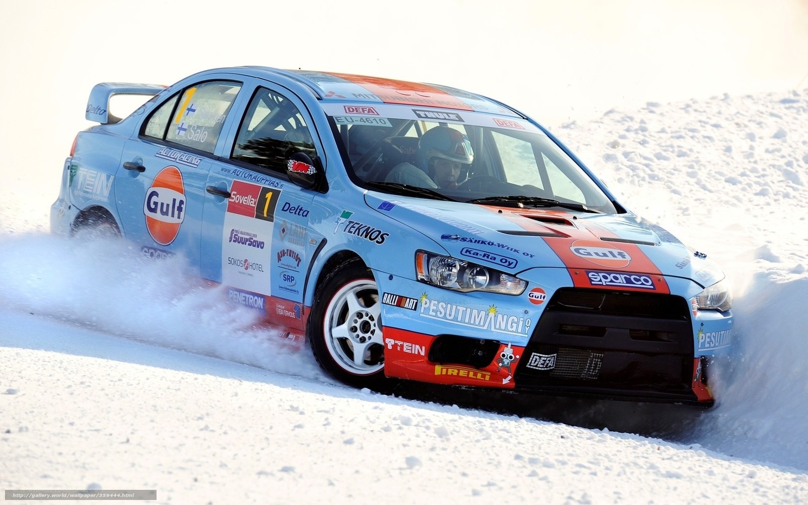 rally car on snowy track
