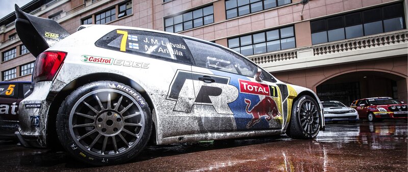 Rally Car on Wet Pavement — White, Dramatic