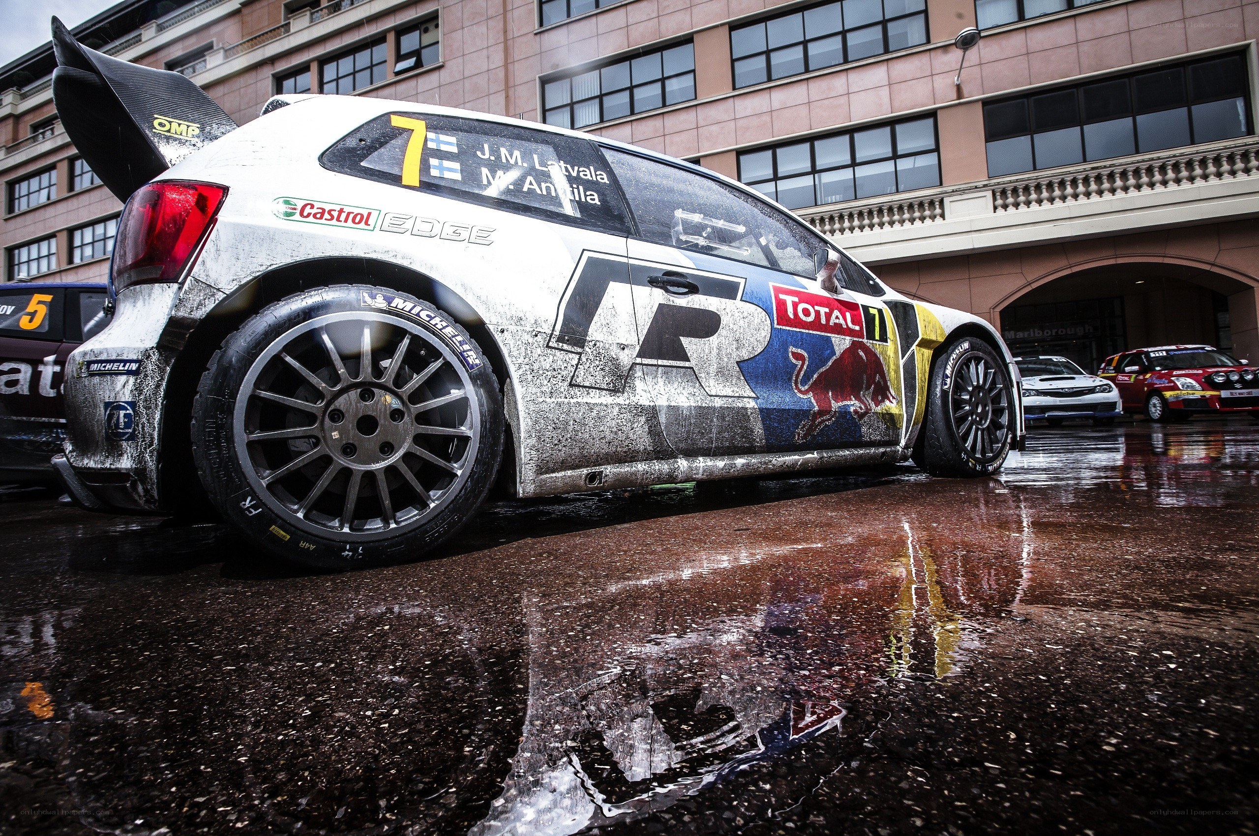 rally car on wet pavement