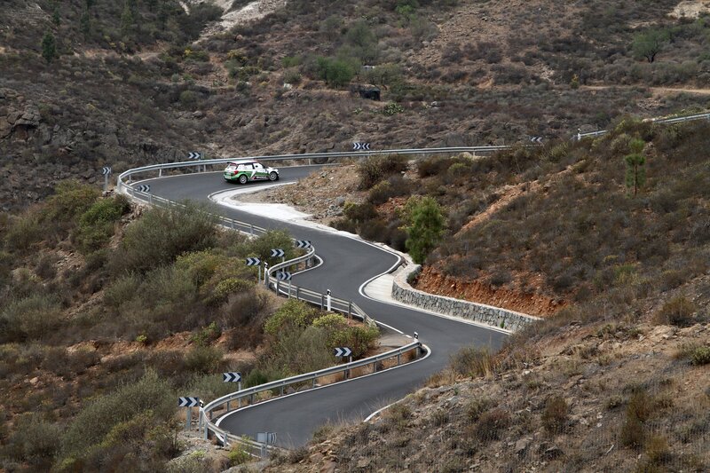 Rally car on winding mountain road