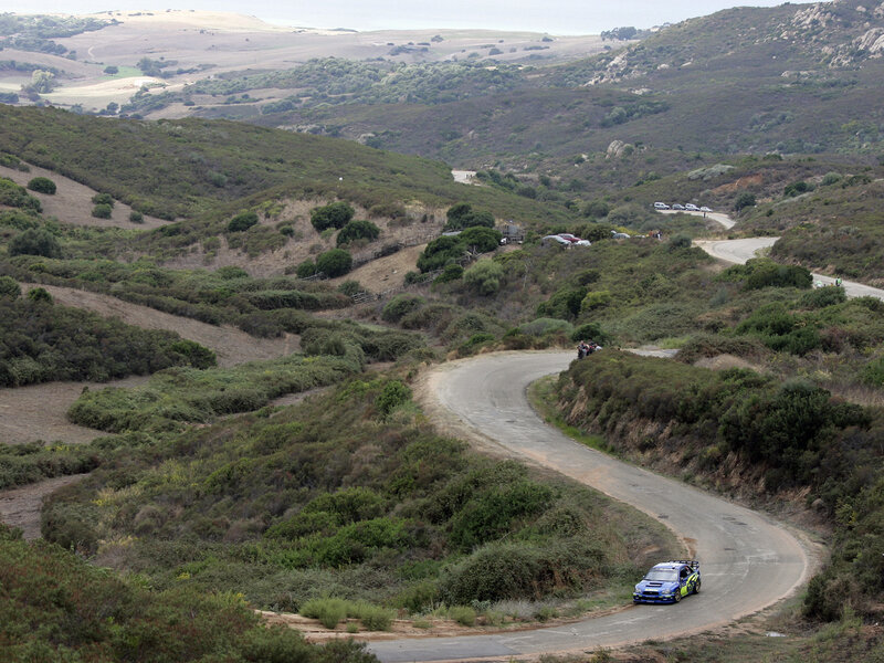 Rally car on winding road